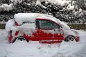 Snowy red car